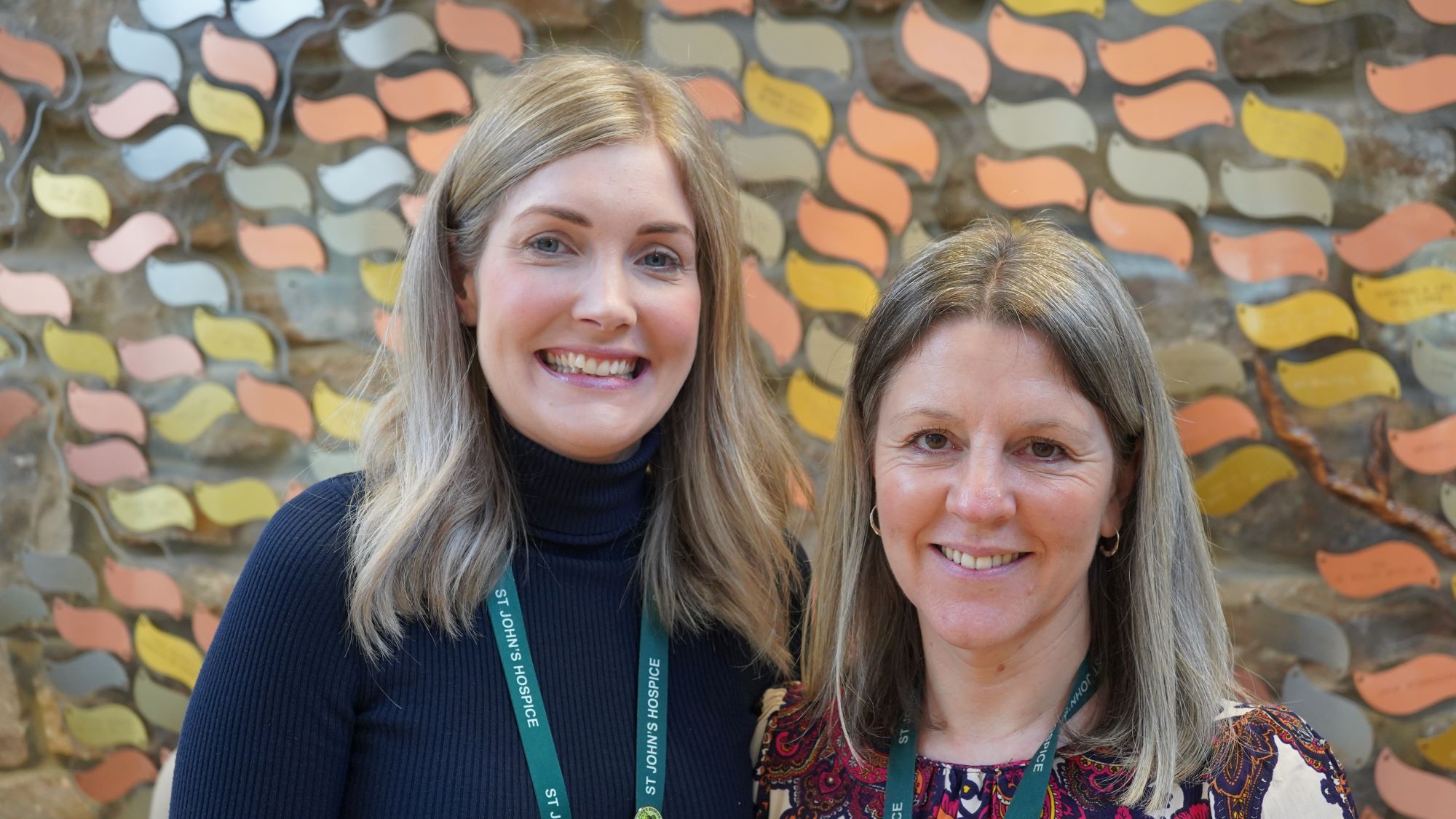 The two St John's Hospice social workers smiling to camera.